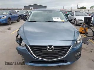 2015 Mazda 3 i SV z VIN JM1BM1T77F1251936, wystawiony jako IAAI lot #42124495 z przebiegiem 82 805 mil mil oraz . Historia ofert i sprzedaży dostępna na DreamBid. Obrazek 13.