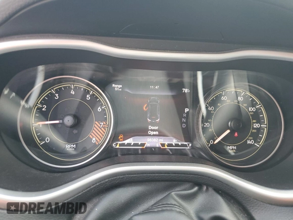 2014 Jeep Cherokee Trailhawk with VIN 1C4PJMBS7EW170345, listed as a Copart auction lot 60565765 with 98,382 mi miles and Salvage title. Bid and sale history available at DreamBid. Image 9.