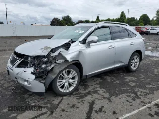 2010 Lexus RX 450h with VIN JTJBC1BA2A2022273, listed as a Copart auction lot 57465834 with 105,515 mi miles and Salvage Title. Bid and sale history available at DreamBid. Image 1.