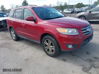 2012 Hyundai Santa Fe SE with VIN 5XYZHDAG6CG105675, listed as a IAAI auction lot 41817704 with 157,320 mi miles. Bid and sale history available at carsss.com. Image 1.
