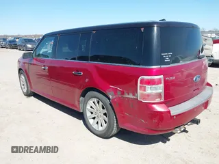 2009 Ford Flex SEL with VIN 2FMDK52C89BA77688, listed as a IAAI auction lot 41763979 with 196,989 mi miles. Bid and sale history available at carsss.com. Image 3.
