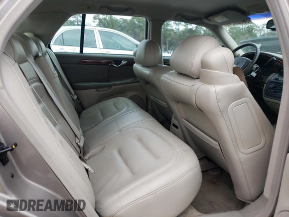 2003 Cadillac DeVille with VIN 1G6KD54Y03U206526, listed as a Copart auction lot 38023213 with 103,724 mi miles and Salvage Title. Bid and sale history available at carsss.com. Image 10.