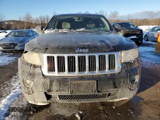 2011 Jeep Grand Cherokee Laredo with VIN 1J4RR4GGXBC669413, listed as a Copart auction lot 41730255 with 215,437 mi miles and Clean Title. Bid and sale history available at carsss.com. Image 5.