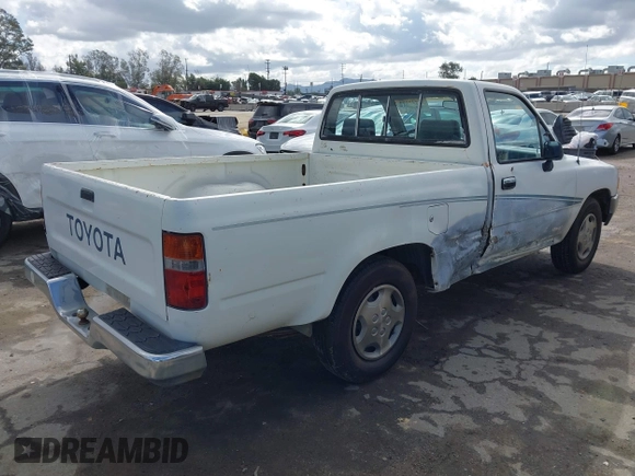 1992 Toyota Pickup DLX z VIN 4TARN81PXNZ004395, wystawiony jako IAAI lot #41729264 z przebiegiem 137 289 mil mil oraz . Historia ofert i sprzedaży dostępna na DreamBid. Obrazek 4.