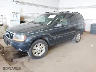 2001 Jeep Grand Cherokee Laredo with VIN 1J4GW48S91C525711, listed as a IAAI auction lot 42048952 with 1 mi miles. Bid and sale history available at carsss.com. Image 2.