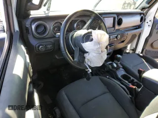 2021 Jeep Wrangler Sport S with VIN 1C4GJXANXMW751236, listed as a Copart auction lot 50683115 with 56,325 mi miles and Salvage Title. Bid and sale history available at DreamBid. Image 8.