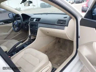 2014 Volkswagen Passat Wolfsburg Ed with VIN 1VWAT7A38EC087906, listed as a IAAI auction lot 41623631 with 124,079 mi miles. Bid and sale history available at carsss.com. Image 5.