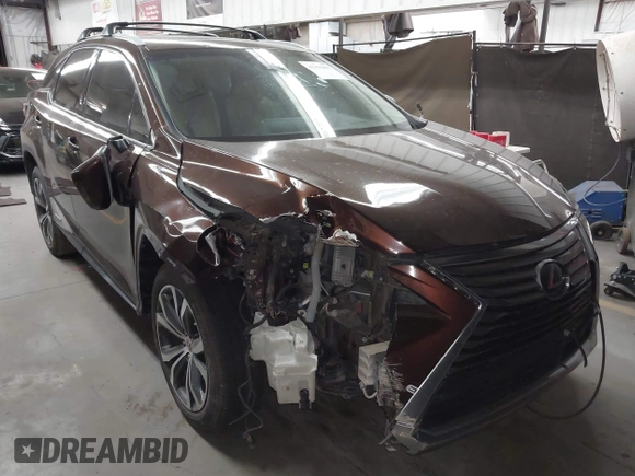 2016 Lexus RX 450h with VIN 2T2BGMCA1GC005462, listed as a IAAI auction lot 42304457 with 87,248 mi miles and . Bid and sale history available at DreamBid. Image 1.
