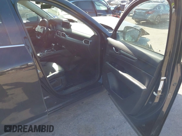 2020 Mazda CX-5 Touring with VIN JM3KFACM0L0780265, listed as a IAAI auction lot 41825873 with 151,888 mi miles. Bid and sale history available at carsss.com. Image 5.