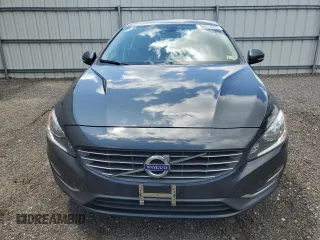 2014 Volvo S60 T5 z VIN YV1612FS6E1287285, wystawiony jako Copart lot #56614785 z przebiegiem 104 637 mil mil oraz Szkody całkowita. Historia ofert i sprzedaży dostępna na DreamBid. Obrazek 5.
