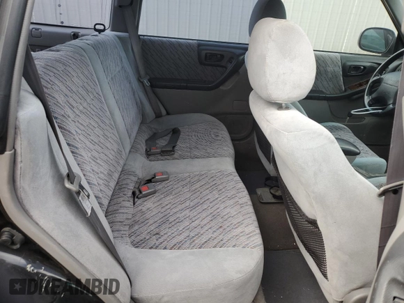 1999 Subaru Forester S with VIN JF1SF6550XH735142, listed as a Copart auction lot 85818264 with 0 mi miles and Salvage Title. Bid and sale history available at carsss.com. Image 11.