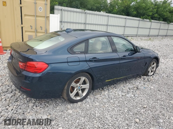 2015 BMW 4 Series 428i xDrive with VIN WBA4C9C57FD330687, listed as a Copart auction lot 67639034 with 114,779 mi miles and Salvage title. Bid and sale history available at DreamBid. Image 3.