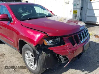 2014 Jeep Grand Cherokee Laredo with VIN 1C4RJFAG8EC262292, listed as a IAAI auction lot 40568162 with 124,871 mi miles and . Bid and sale history available at DreamBid. Image 6.