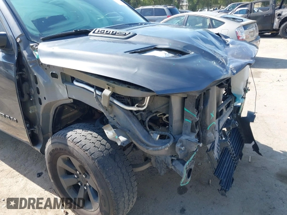 2019 Ram 1500 Rebel z VIN 1C6SRFLT2KN696557, wystawiony jako IAAI lot #42110931 z przebiegiem 81 372 mil mil oraz . Historia ofert i sprzedaży dostępna na DreamBid. Obrazek 18.