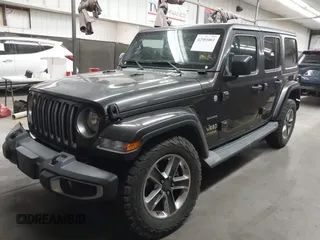 2019 Jeep Wrangler Unlimited Sahara с VIN 1C4HJXEN8KW588369, выставлен на аукционе IAAI как лот 42581061 с пробегом 90 710 миль миль и . История ставок и продаж доступна на DreamBid. Изображение 18.