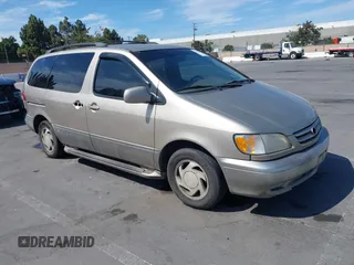 2001 Toyota Sienna LE with VIN 4T3ZF13CX1U323051, listed as a IAAI auction lot 42674233 with 203,045 mi miles and . Bid and sale history available at DreamBid. Image 1.