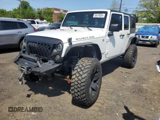 2013 Jeep Wrangler Unlimited Rubicon with VIN 1C4HJWFG2DL549064, listed as a Copart auction lot 56474055 with 148,217 mi miles and Salvage title. Bid and sale history available at DreamBid. Image 1.