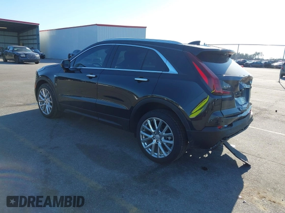 2021 Cadillac XT4 FWD Luxury with VIN 1GYAZAR46MF074767, listed as a IAAI auction lot 41652091 with 46,631 mi miles and . Bid and sale history available at DreamBid. Image 3.