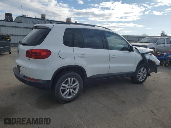 2017 Volkswagen Tiguan S with VIN WVGAV7AX9HK017871, listed as a Copart auction lot 48767785 with 49,608 mi miles and Salvage Title. Bid and sale history available at DreamBid. Image 3.