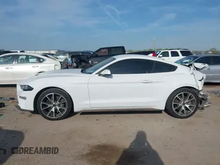 2021 Ford Mustang EcoBoost z VIN 1FA6P8TD5M5133239, wystawiony jako IAAI lot #41899042 z przebiegiem 65 553 mil mil oraz . Historia ofert i sprzedaży dostępna na DreamBid. Obrazek 14.