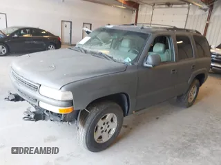 2004 Chevrolet Tahoe LS with VIN 1GNEK13ZX4J204098, listed as a IAAI auction lot 42143393 with 293,548 mi miles. Bid and sale history available at carsss.com. Image 2.