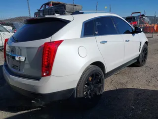 2011 Cadillac SRX Premium Collection with VIN 3GYFNCEY2BS624867, listed as a IAAI auction lot 41273945 with 209,296 mi miles. Bid and sale history available at carsss.com. Image 4.