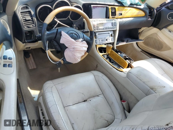 2002 Lexus SC 430 с VIN JTHFN48YX20002417, выставлен на аукционе Copart как лот 59401805 с пробегом Не указан миль и На запчасти • Non repairable. История ставок и продаж доступна на DreamBid. Изображение 8.
