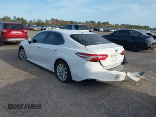 2019 Toyota Camry LE with VIN 4T1B11HK7KU806197, listed as a IAAI auction lot 41721148 with 83,373 mi miles and . Bid and sale history available at DreamBid. Image 3.