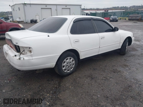 1994 Toyota Camry LE with VIN 4T1SK12E9RU848607, listed as a IAAI auction lot 41972535 with 152,468 mi miles. Bid and sale history available at carsss.com. Image 4.