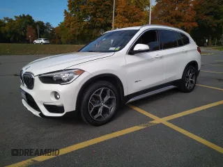 2016 BMW X1 xDrive28i z VIN WBXHT3C3XGP880243, wystawiony jako Copart lot #58436475 z przebiegiem 56 396 mil mil oraz Tytuł czysty. Historia ofert i sprzedaży dostępna na DreamBid. Obrazek 2.