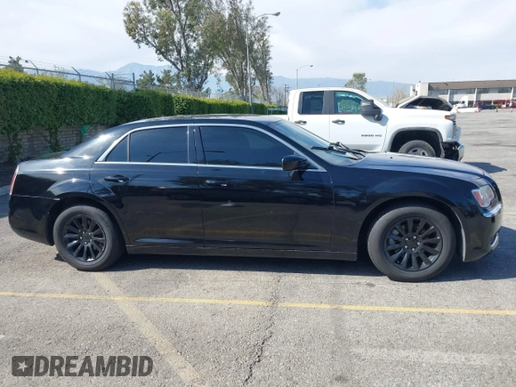 2014 Chrysler 300 with VIN 2C3CCAAG9EH264914, listed as a IAAI auction lot 42003052 with 103,789 mi miles. Bid and sale history available at carsss.com. Image 13.