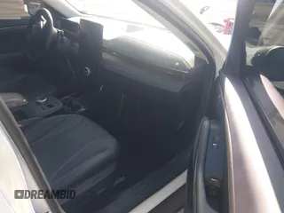 2024 Ford Mustang Mach-E Premium z VIN 3FMTK3R70RMA06461, wystawiony jako IAAI lot #41483098 z przebiegiem 5 647 mil mil oraz . Historia ofert i sprzedaży dostępna na DreamBid. Obrazek 5.