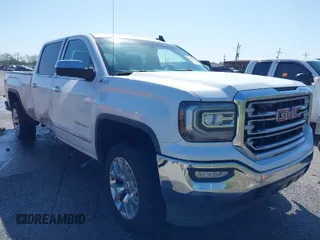2016 GMC Sierra 1500 SLT with VIN 3GTU2NEC9GG266067, listed as a IAAI auction lot 41973996 with 140,995 mi miles and . Bid and sale history available at DreamBid. Image 1.