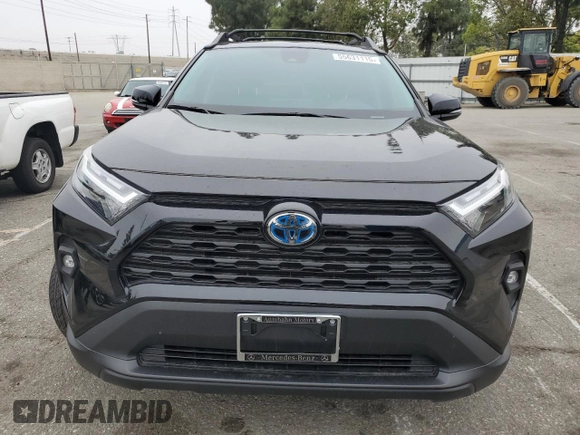 2023 Toyota RAV4 Hybrid XLE with VIN 2T3UWRFV7PW177240, listed as a Copart auction lot 55631115 with 7,655 mi miles and Salvage title. Bid and sale history available at DreamBid. Image 5.