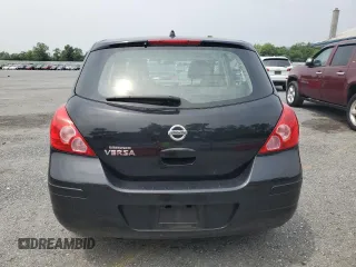 2009 Nissan Versa SL с VIN 3N1BC13E79L475810, выставлен на аукционе Copart как лот 61073065 с пробегом 90 531 миль миль и Списание • Salvage title. История ставок и продаж доступна на DreamBid. Изображение 6.