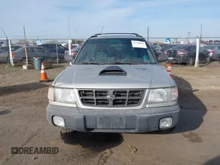 2000 Subaru Forester L with VIN JF1SF6355YH721788, listed as a IAAI auction lot 41736026 with 305,157 mi miles. Bid and sale history available at carsss.com. Image 6.