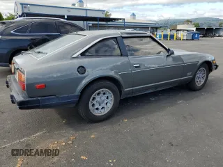 1983 Datsun 280ZX z VIN JN1CZ06S1DX700637, wystawiony jako Copart lot #53893855 z przebiegiem 93 909 mil mil oraz Tytuł czysty. Historia ofert i sprzedaży dostępna na DreamBid. Obrazek 3.