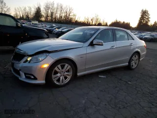 2011 Mercedes-Benz E-Class E 350 Luxury BlueTEC with VIN WDDHF2EB6BA306999, listed as a Copart auction lot 82699884 with 113,855 mi miles and Salvage Title. Bid and sale history available at carsss.com. Image 1.