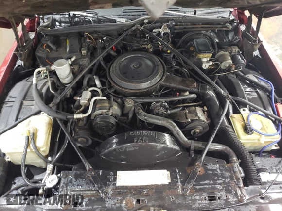 1988 Cadillac Brougham z VIN 1G6DW51Y2JR766782, wystawiony jako Copart lot #83797924 z przebiegiem 63 601 mil mil oraz Szkody całkowita. Historia ofert i sprzedaży dostępna na DreamBid. Obrazek 11.