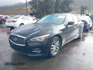 2014 Infiniti Q50 with VIN JN1BV7AP8EM675841, listed as a IAAI auction lot 41582924 with 139,637 mi miles. Bid and sale history available at carsss.com. Image 2.