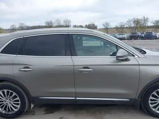 2016 Lincoln MKX Select with VIN 2LMTJ8KR9GBL57397, listed as a IAAI auction lot 42104585 with 286,562 mi miles. Bid and sale history available at carsss.com. Image 13.