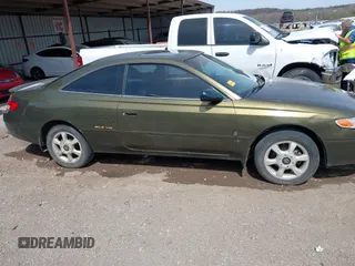 1999 Toyota Solara SE with VIN 2T1CF22PXXC247611, listed as a IAAI auction lot 41863240 with 153,823 mi miles. Bid and sale history available at carsss.com. Image 14.