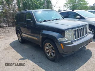 2011 Jeep Liberty Limited 70th Anniversary z VIN 1J4PN5GK9BW586132, wystawiony jako IAAI lot #42453710 z przebiegiem 130 390 mil mil oraz . Historia ofert i sprzedaży dostępna na DreamBid. Obrazek 1.