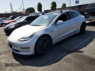 2018 Tesla Model 3 Long Range Battery z VIN 5YJ3E1EA6JF005289, wystawiony jako Copart lot #59325765 z przebiegiem 106 153 mil mil oraz Czysty tytuł • Clean title. Historia ofert i sprzedaży dostępna na DreamBid. Obrazek 1.