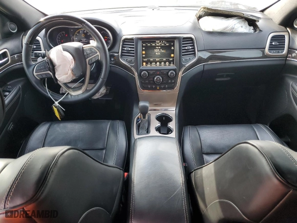 2017 Jeep Grand Cherokee Overland with VIN 1C4RJECG3HC868255, listed as a Copart auction lot 83041054 with 121,604 mi miles and Salvage Title. Bid and sale history available at carsss.com. Image 8.