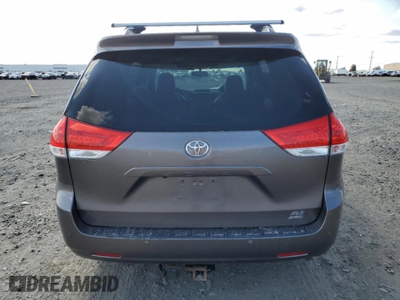 2011 Toyota Sienna XLE with VIN 5TDDK3DC2BS028058, listed as a Copart auction lot 54374215 with 216,905 mi miles and Salvage Title. Bid and sale history available at DreamBid. Image 6.