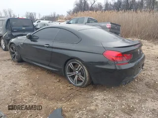 2014 BMW M6 z VIN WBSLX9C58ED160558, wystawiony jako IAAI lot #41553209 z przebiegiem 154 789 mil mil oraz . Historia ofert i sprzedaży dostępna na DreamBid. Obrazek 3.