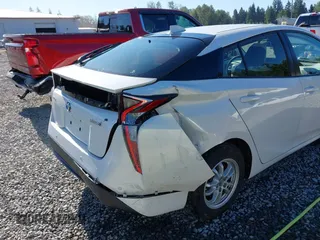 2017 Toyota Prius Two z VIN JTDKARFU1H3033538, wystawiony jako IAAI lot #42362770 z przebiegiem 74 671 mil mil oraz . Historia ofert i sprzedaży dostępna na DreamBid. Obrazek 6.