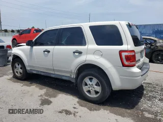 2011 Ford Escape XLS with VIN 1FMCU9C74BKC30951, listed as a Copart auction lot 57912165 with 159,079 mi miles and Salvage title. Bid and sale history available at DreamBid. Image 2.