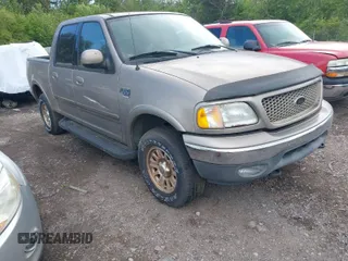 2003 Ford F-150 XLT with VIN 1FTRW08L63KD06455, listed as a IAAI auction lot 41988549 with 138,168 mi miles. Bid and sale history available at carsss.com. Image 1.